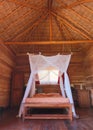 Mosquito net on the bed Royalty Free Stock Photo