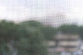 Mosquito net on a PVC window Royalty Free Stock Photo