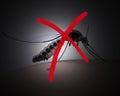Mosquito with red cross sign on dark background Royalty Free Stock Photo