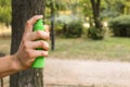 Mosquito repellent. Men using insect spray outdoors, insect bites,mosquito bite,itching of skin diseases,allergy,rashin outdoor Royalty Free Stock Photo