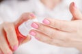 Mosquito repellent. Woman using insect repellent spray