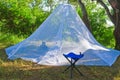 Mosquitoes tent and a chair