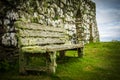 Moss coverd bench at Trumpan Church on Isle of Skye in Scotland Royalty Free Stock Photo