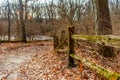 Moss Covered Fence in the Forest on a Trail during Winter at Suburban Willow Springs Royalty Free Stock Photo