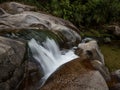 Moss covered natural waterslide rockpools Cleopatras Pool at Torrent river Bay in Abel Tasman National Park New Zealand Royalty Free Stock Photo