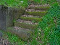 Moss-covered old stairs Ancient architecture. Remains of an old castle. Fortification building. Sights of Georgia. Temple of Royalty Free Stock Photo