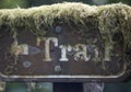 Moss covered trail sign Royalty Free Stock Photo