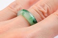 Moss in snow jadeite ring on hand Royalty Free Stock Photo