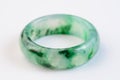 Moss in snow jadeite ring on white background Royalty Free Stock Photo