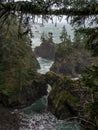 Mossy Rocks And Rough Surf Along Oregon Coast