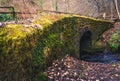 Mossy stone bridge Royalty Free Stock Photo