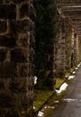 A mossy stonetunel with a gloomy ambience