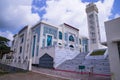 Beautiful architecture Model Mosque in Bangladesh with a White cloudy Blue sky Royalty Free Stock Photo