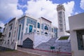 Beautiful architecture Model Mosque in Bangladesh with a White cloudy Blue sky Royalty Free Stock Photo