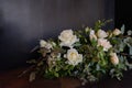 Bouquet of flowers on a leg in the interior of the restaurant for a celebration shop floristry or wedding salon