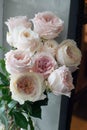 Bouquet of flowers on a leg in the interior of the restaurant for a celebration shop floristry or wedding salon Royalty Free Stock Photo