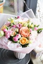 Bouquet of flowers on a leg in the interior of the restaurant for a celebration shop floristry or wedding salon