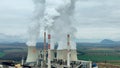 MOST, CZECH REPUBLIC, NOVEMBER 15, 2020: Coal brown power plant factory fired station Pocerady, chimney smokes stacks Royalty Free Stock Photo