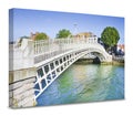 The most famous bridge in Dublin called Half penny bridge due to the toll charged for the passage (Ireland) Royalty Free Stock Photo