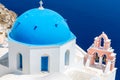 The most famous church on Santorini Island,Crete, Greece. Bell tower and cupolas of classical orthodox Greek church Royalty Free Stock Photo