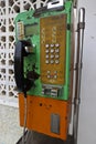 Old fashioned coin operated public telephone