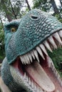 The most scary dinosaur`s face sculpture photograph