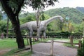 The most scary and huge dinosaur sculpture placed in jungle park photograph Royalty Free Stock Photo