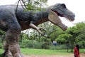 The most scary and huge dinosaur sculpture placed in jungle park photograph