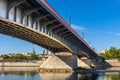 Most Slasko-Dabrowski bridge over Vistula river with Srodmiescie city center at Wybrzeze Kosciuszkowskie embankment in Warsaw, Royalty Free Stock Photo