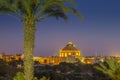 Mosta, Malta - The Mosta Dome with palm tree by night