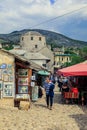 Old Town in city center of Mostar with the Colorful Traditional Souvenirs with Walking Tourists