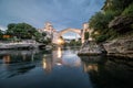 Mostar medieval ottoman stone bridge in Bosnia and Herzegovina in Balkan over Neretva river