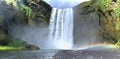 Skogafoss Waterfall with Double Rainbow Landscape Panorama, Katla Geopark, South Coast of Iceland Royalty Free Stock Photo