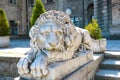 Moszna, Poland, August 14, 2021: beautiful concrete sculpture of a lion near the castle.