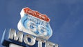 Motel retro sign on historic route 66 famous travel destination, vintage symbol of road trip in USA. Iconic lodging signboard in Royalty Free Stock Photo