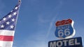 Motel retro sign on historic route 66 famous travel destination, vintage symbol of road trip in USA. Iconic lodging signboard in Royalty Free Stock Photo