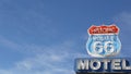 Motel retro sign on historic route 66 famous travel destination, vintage symbol of road trip in USA. Iconic lodging signboard in