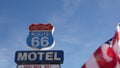 Motel retro sign on historic route 66 famous travel destination, vintage symbol of road trip in USA. Iconic lodging signboard in Royalty Free Stock Photo