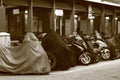 the moterbike parked and lined up on urban street Royalty Free Stock Photo