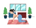 The mother is on all fours, the woman is doing relaxing back exercises in the living room, practicing yoga. Calm parent