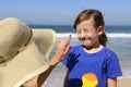 Mother applying sunscreen