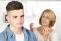 Mother Arguing With Teenage Son At Home Royalty Free Stock Photo