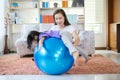 A mother, Asian daughters, happily playing at home, mother and daughter smiles