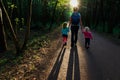 Mother awith kids walking in sunset nature Royalty Free Stock Photo