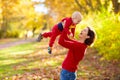 Mother and baby in autumn. Fall outdoor family fun Royalty Free Stock Photo