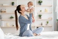 Mother Baby Bonding. Young Mum Playing With Her Infant Child At Home Royalty Free Stock Photo