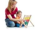 Mother and baby boy play with counter toy Royalty Free Stock Photo