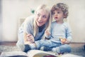 Mother and baby boy spending time together, have play. Royalty Free Stock Photo