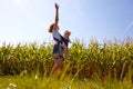 Mother with baby on the corn field Royalty Free Stock Photo