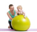 Mother with baby doing gymnastic on fitness ball Royalty Free Stock Photo